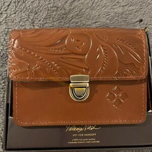 Patricia Nash Brown Wallet with Embossed Floral Design and Gold Clasp